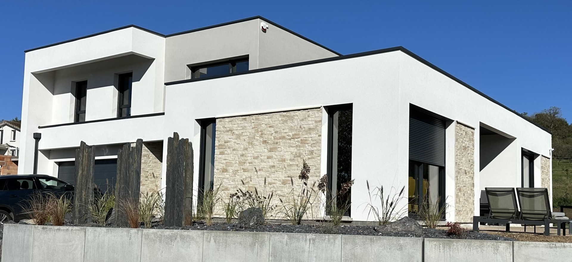 Villa moderne en toiture terrasse par Maisons Atrium