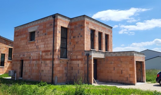 Maison moderne avec toiture terrasse au sud de Nancy